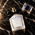 ALPHA Legacy Edition 50 mL lying on black marble with the cap off